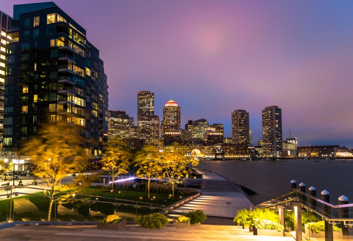 View of Boston skyline and Seaport distric waterfront at night