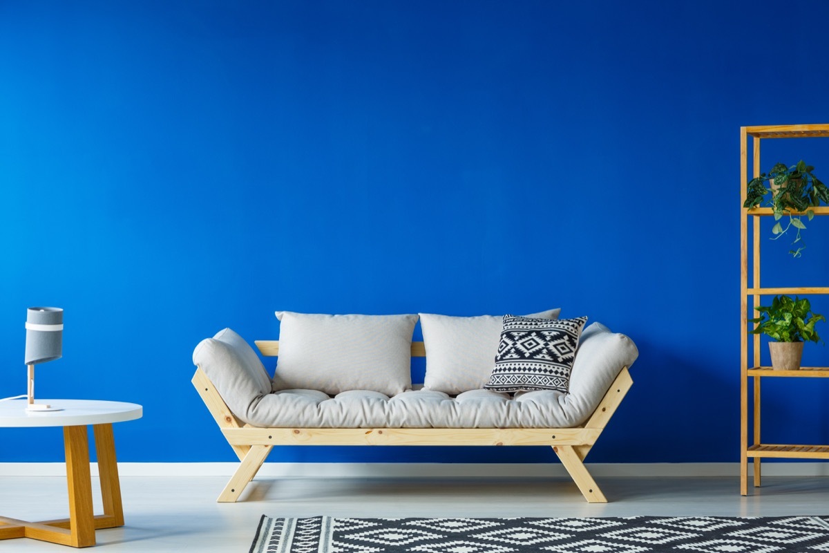 living room with bright blue wall