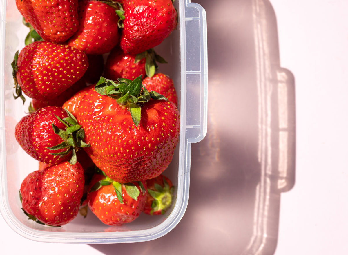 strawberries in plastic container