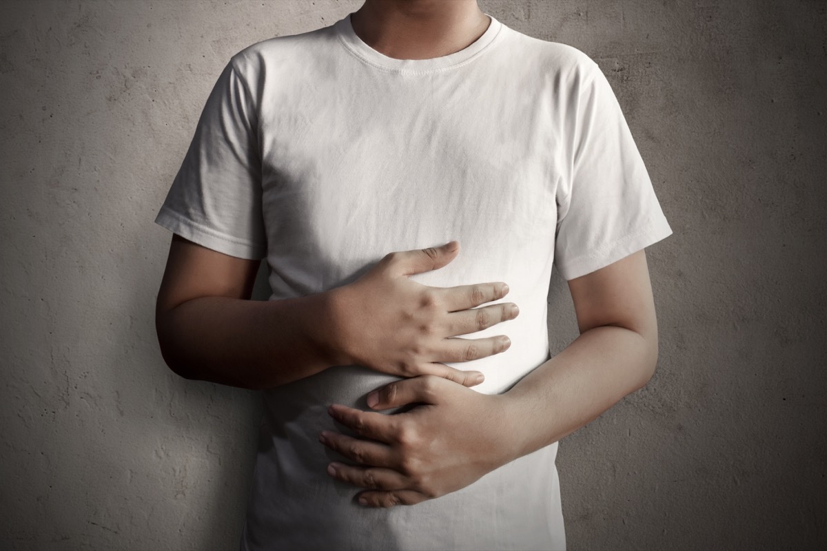 Man Holding His Stomach Out of Hunger Commonly Misused Phrases