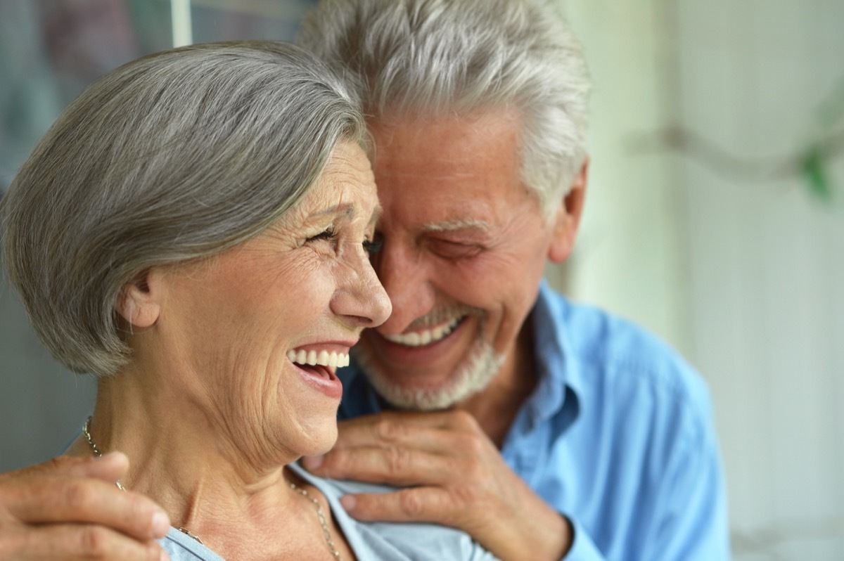 Older couple laughing together