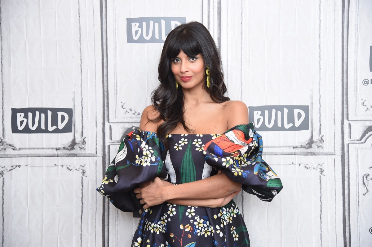 jameela jamil in floral off-the-shoulder dress on red carpet