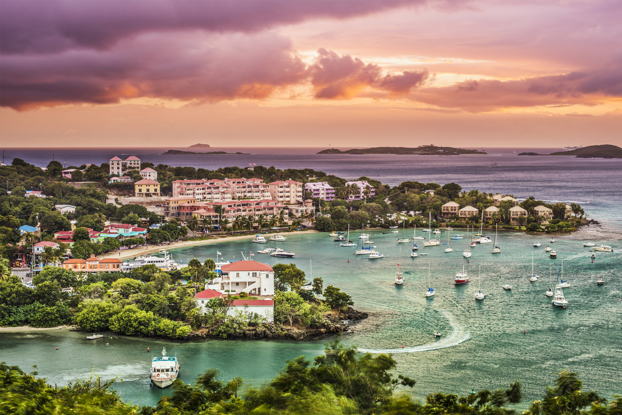 An aerial photo of boats in Cruz Bay, St. John in the U.S. Virgin Islands at sunset.