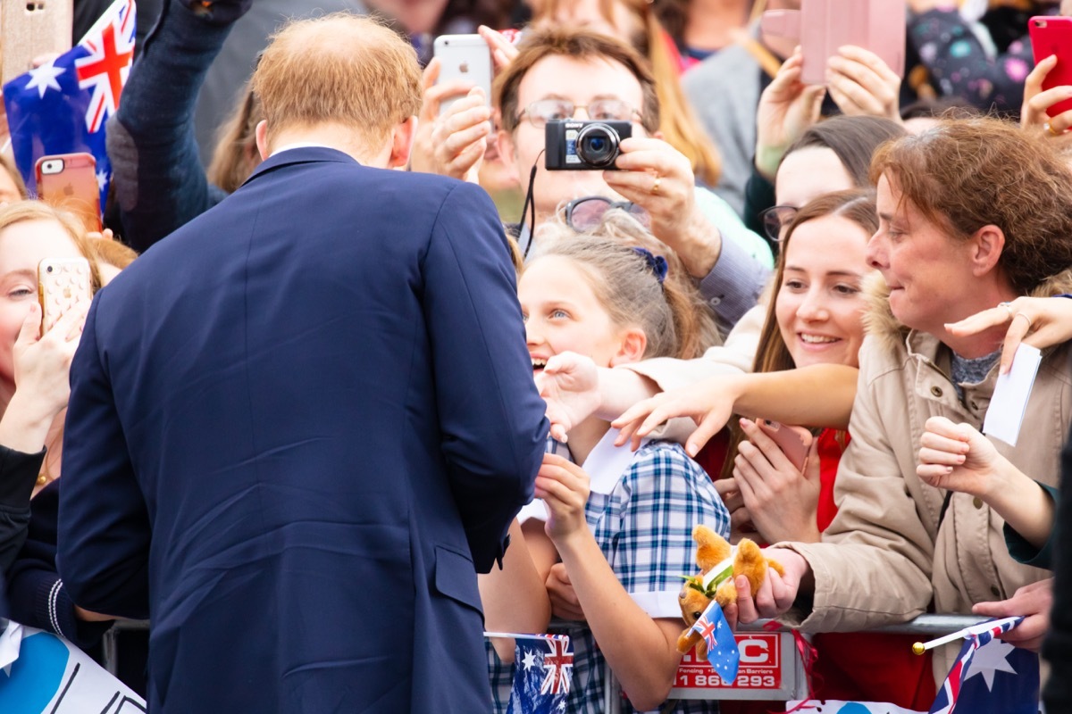 prince harry speaking to a crowd of kids, prince harry father