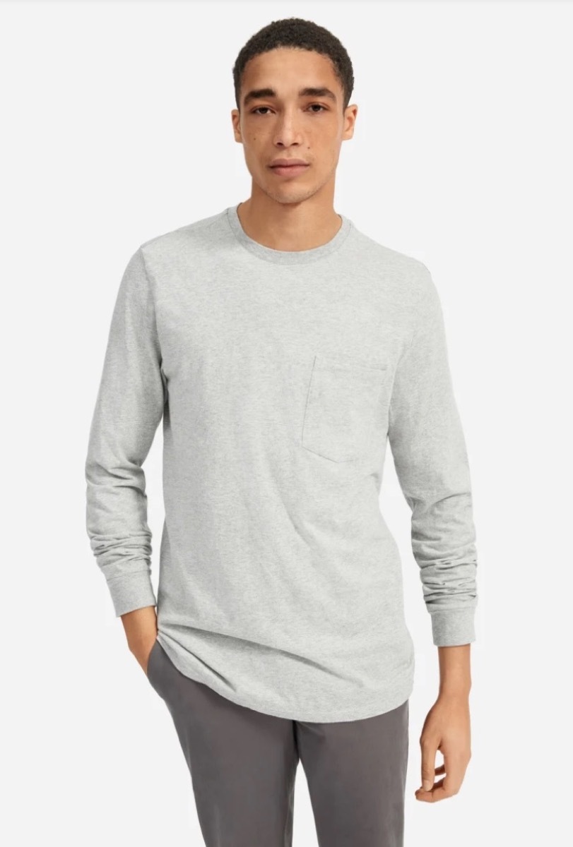 young man in long-sleeved gray t-shirt