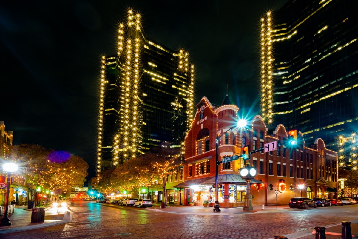 cityscape photo of Main Street and the downtown Fort Worth, Texas at night