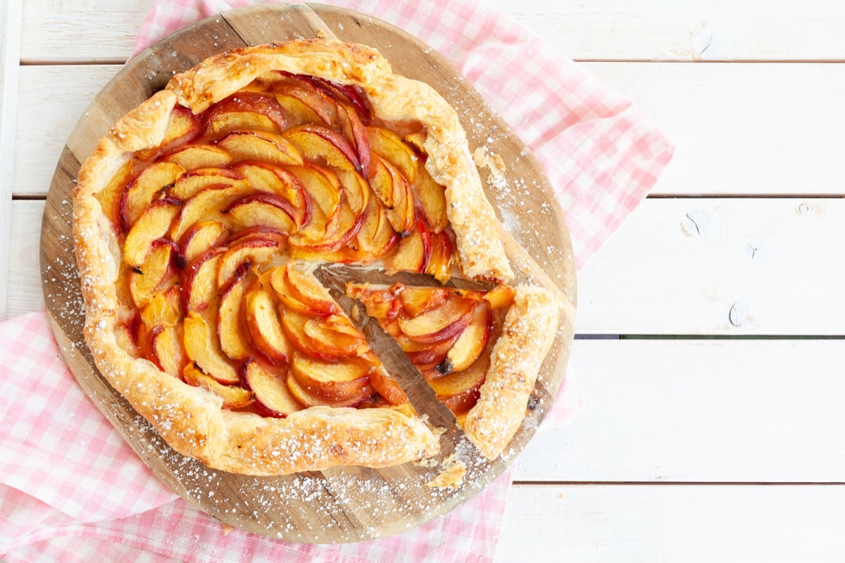 homemade peach pie made with flakey puff pastry