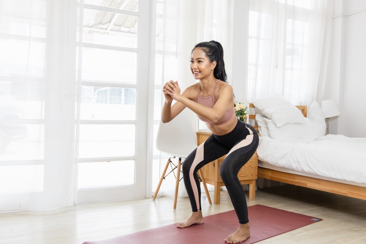 Woman Doing Body Weight Squats