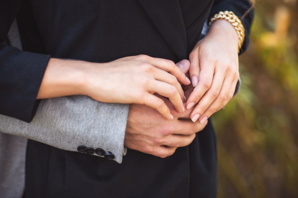 couple holding hands Body Flaws