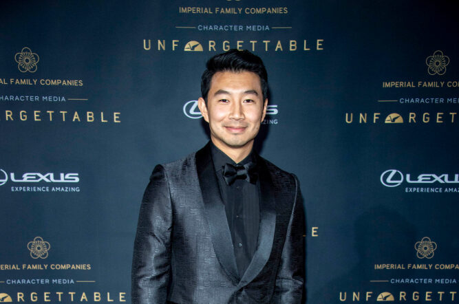 Actor Simu Liu standing on the red carpet