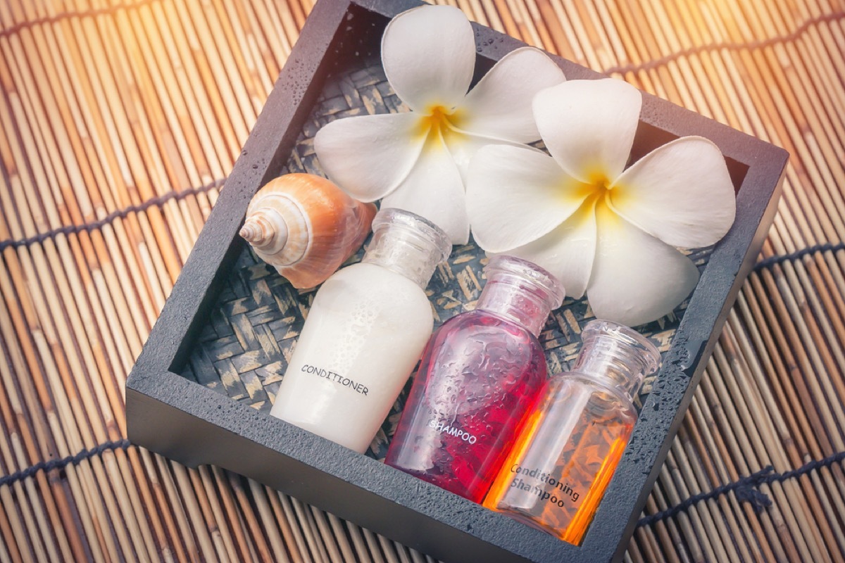 set of travel toiletries with flowers and seashells