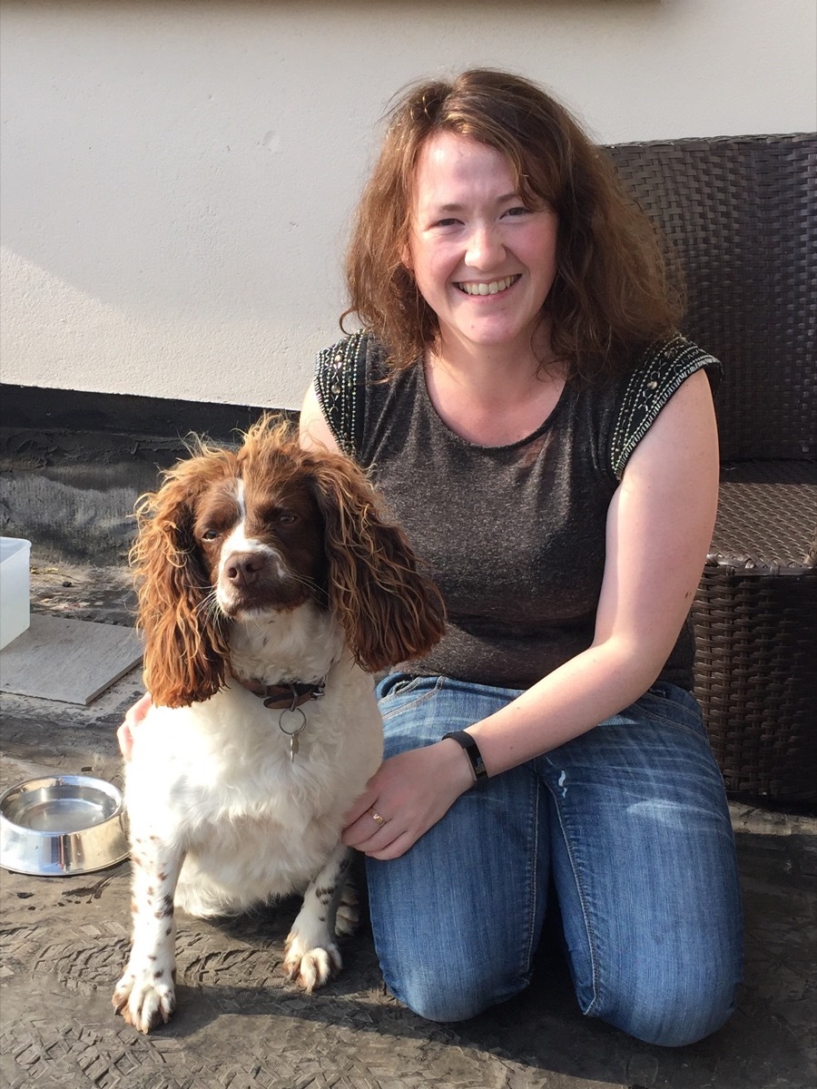 woman and her dog sporting the same hairstyle dogs who look like their owners