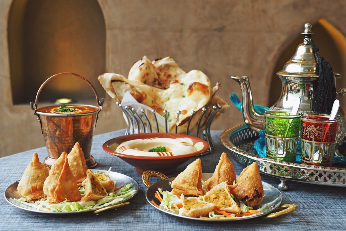 A Dinner Spread With Samosas Ramadan