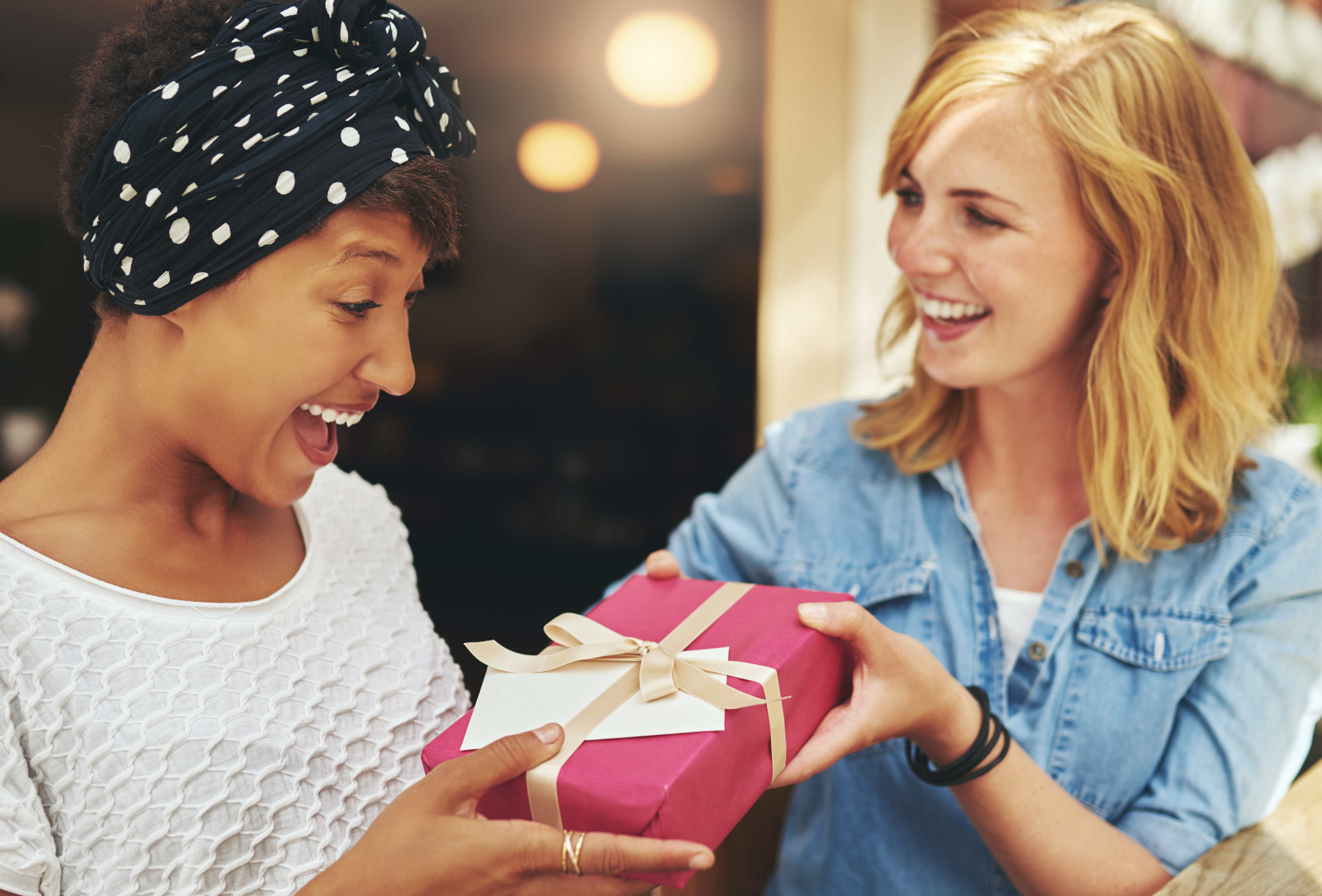 woman receiving such a thoughtful gift from a friend