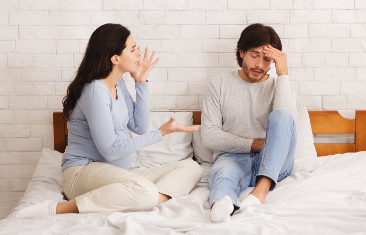 Man and Woman Fighting in Bed