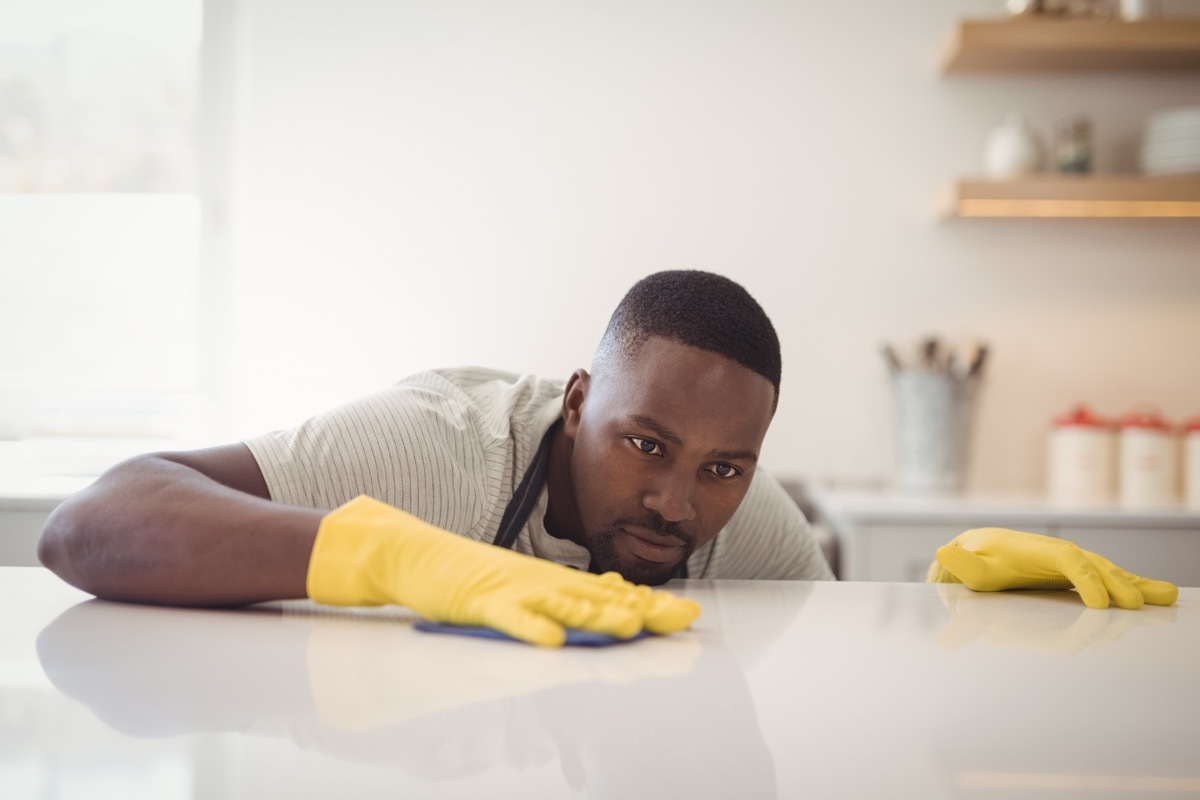 Wiping down kitchen counter