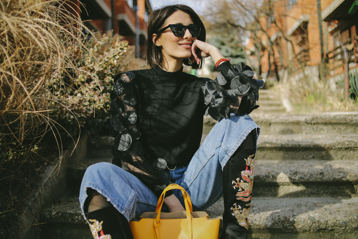 young woman in cropped diy jeans