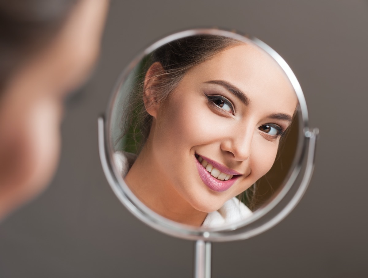 Portrait of a young brunette cosmetics beauty