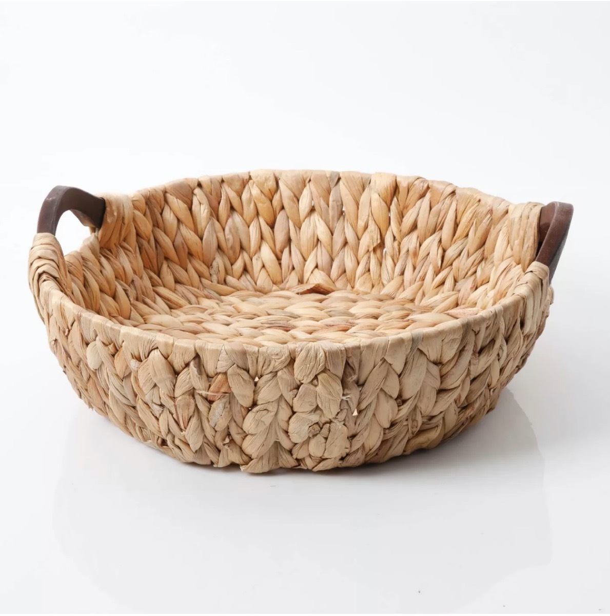 woven basket with leather handles