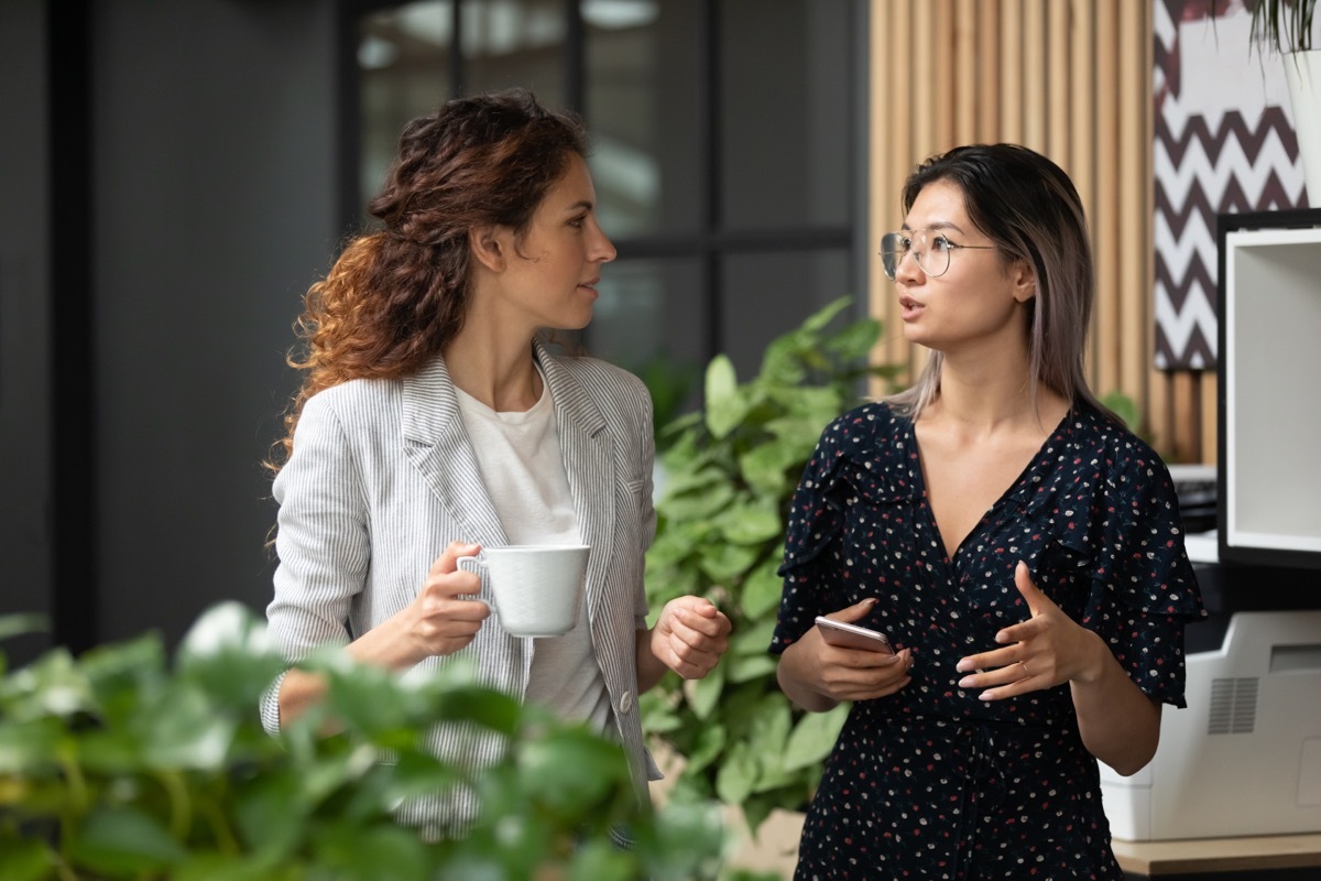 Two Employees Discussing Plans