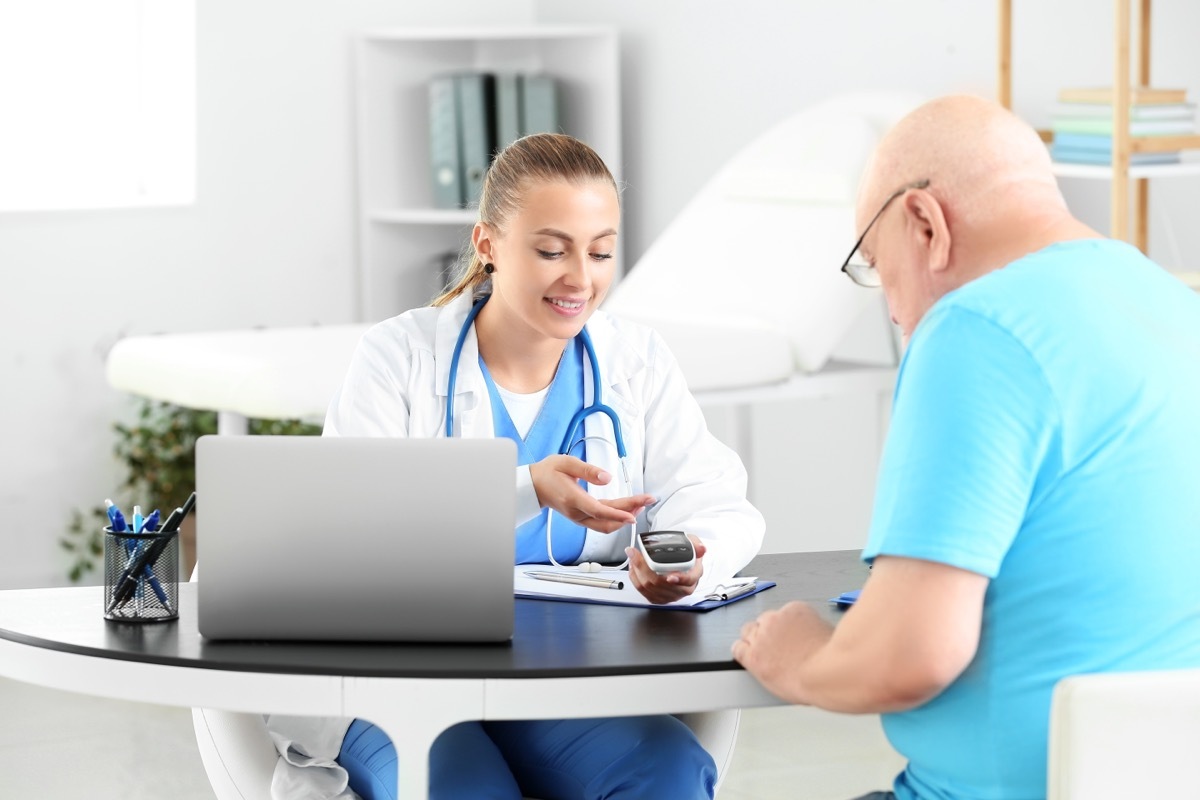 Senior diabetic man visiting doctor in clinic