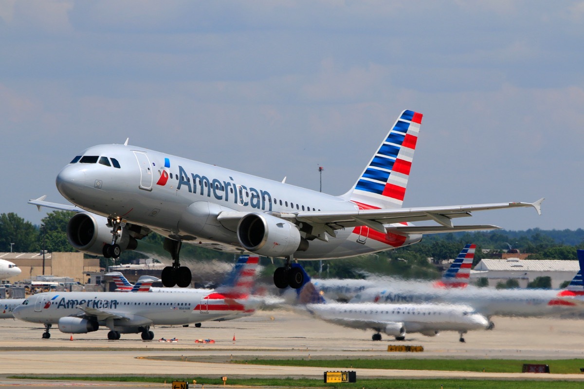 American Airlines Airbus A319 (Registration No. N723UW) taking off at Charlotte Douglas International Airport.