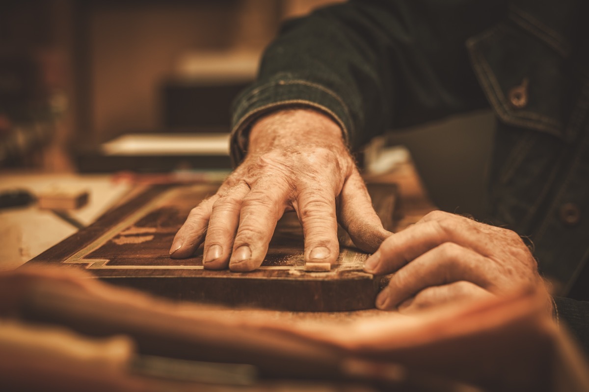 Older man with older furniture