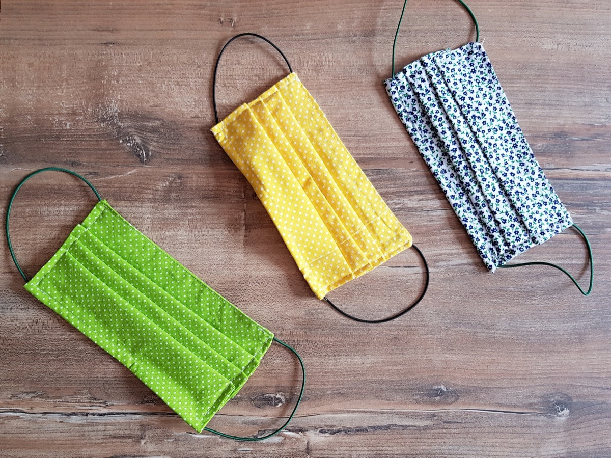 three fabric masks on table