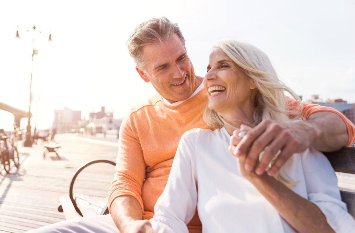 Man and woman on a date, sitting outside