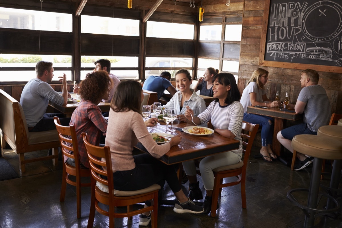 women eating in crowded reataurant