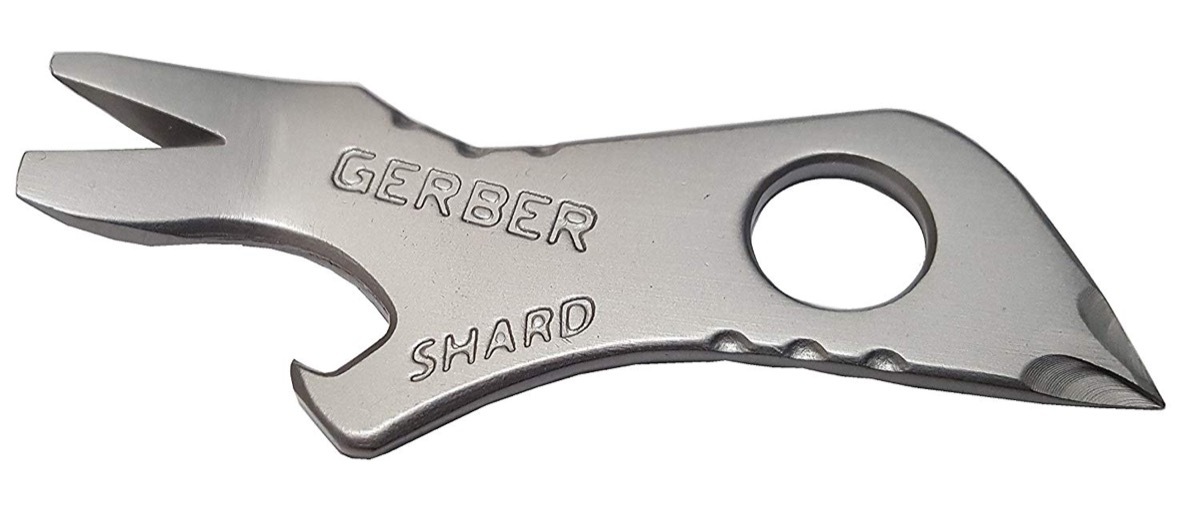 silver keychain multitool on white background