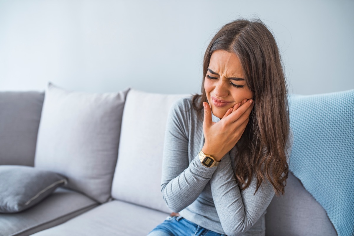 Woman with cavity pain