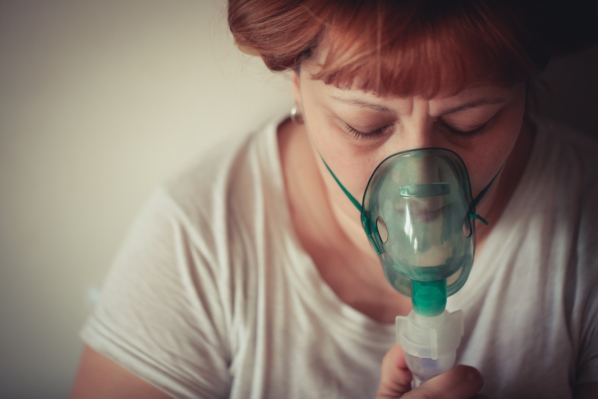 Teenage boy and mother in a process of healing. Daily asthma care. Very Shallow DOF. Developed from RAW; retouched with special care and attention; Small amount of grain added for best final impression.