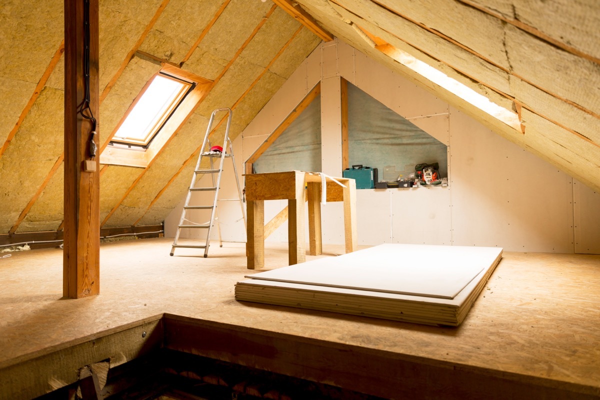 partially finished attic with visible insulation