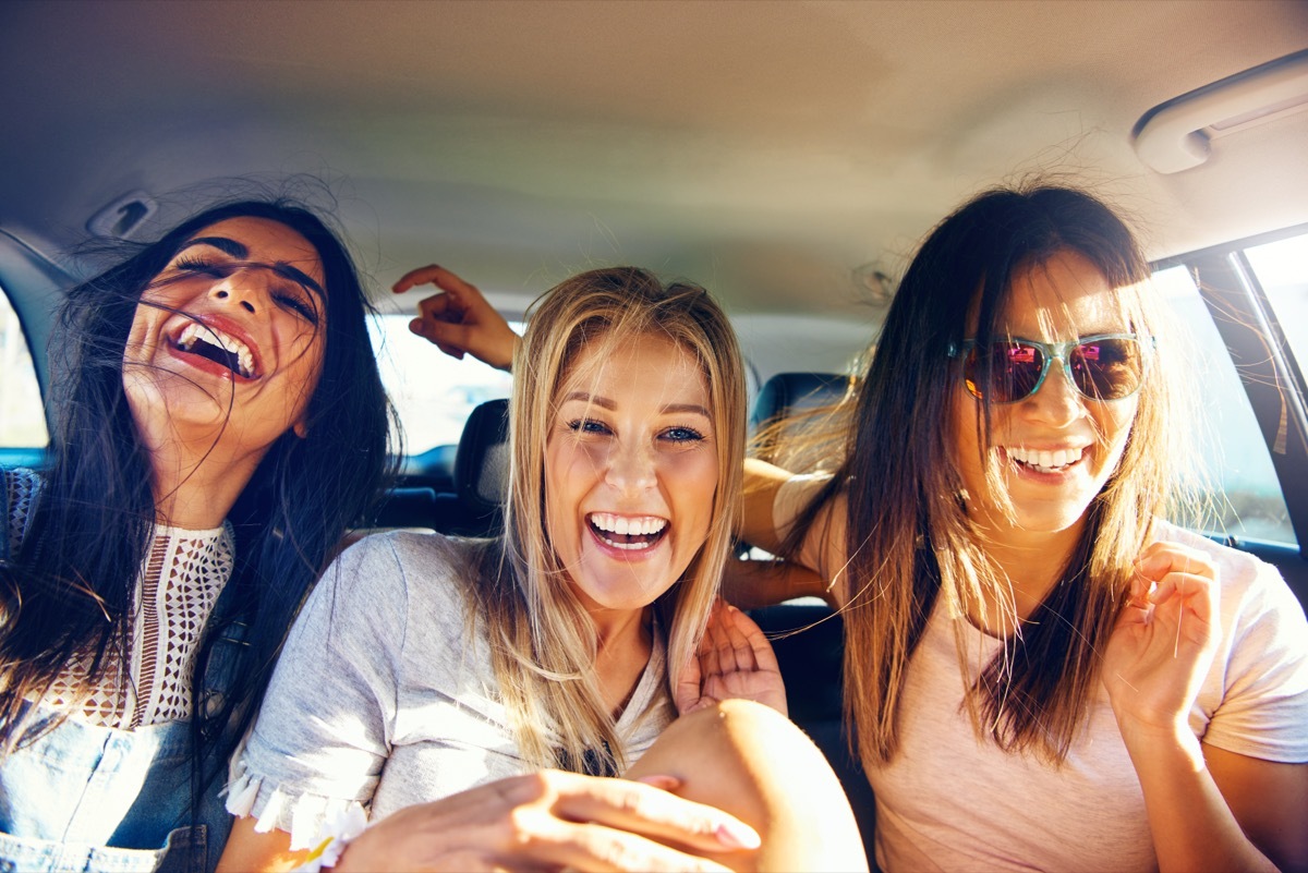 Three Girls Laughing in the Backseat