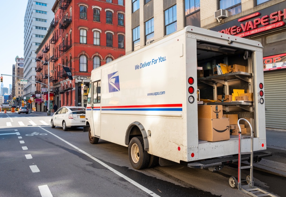 USPS truck delivering packages